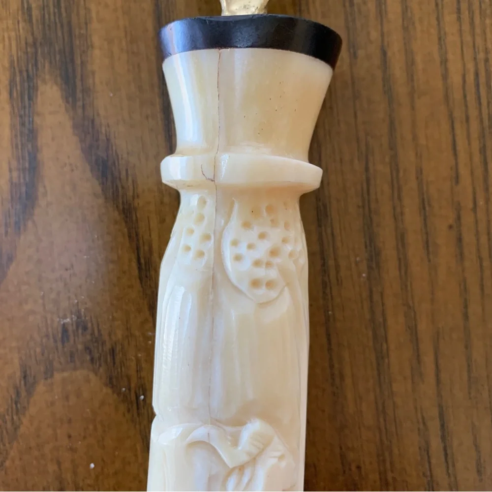 Bone carved bottle opener